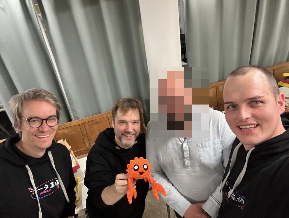 Selfie with Daniel Wilms and Tomas Karlsson, all wearing the SPREAD Data Team 'Data Kakumei' hoodies